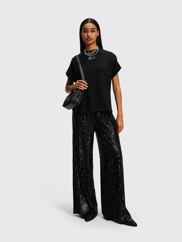 Pants with appliquéd sequins - 4