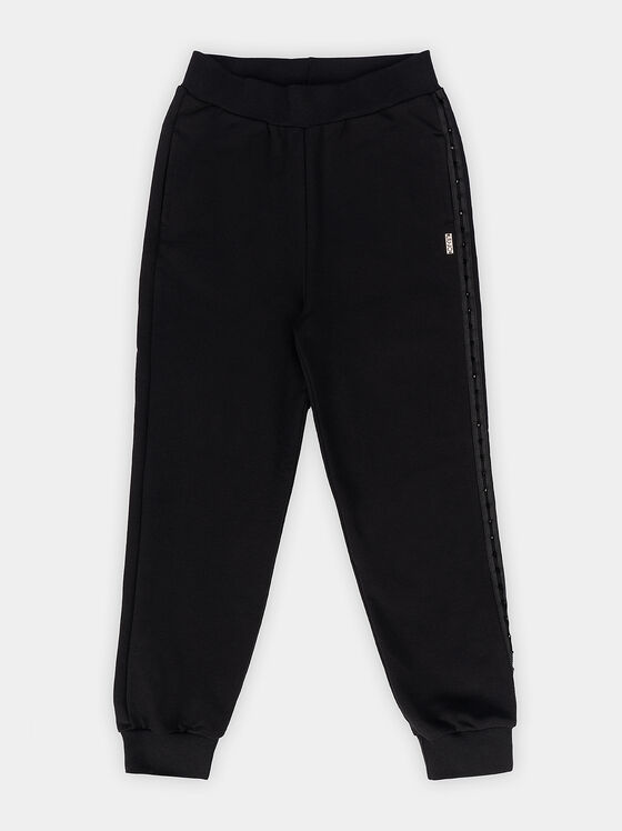 Sports trousers with logo detail and shiny accents - 1