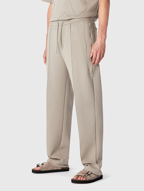 Sports trousers with crease in beige colour  - 1