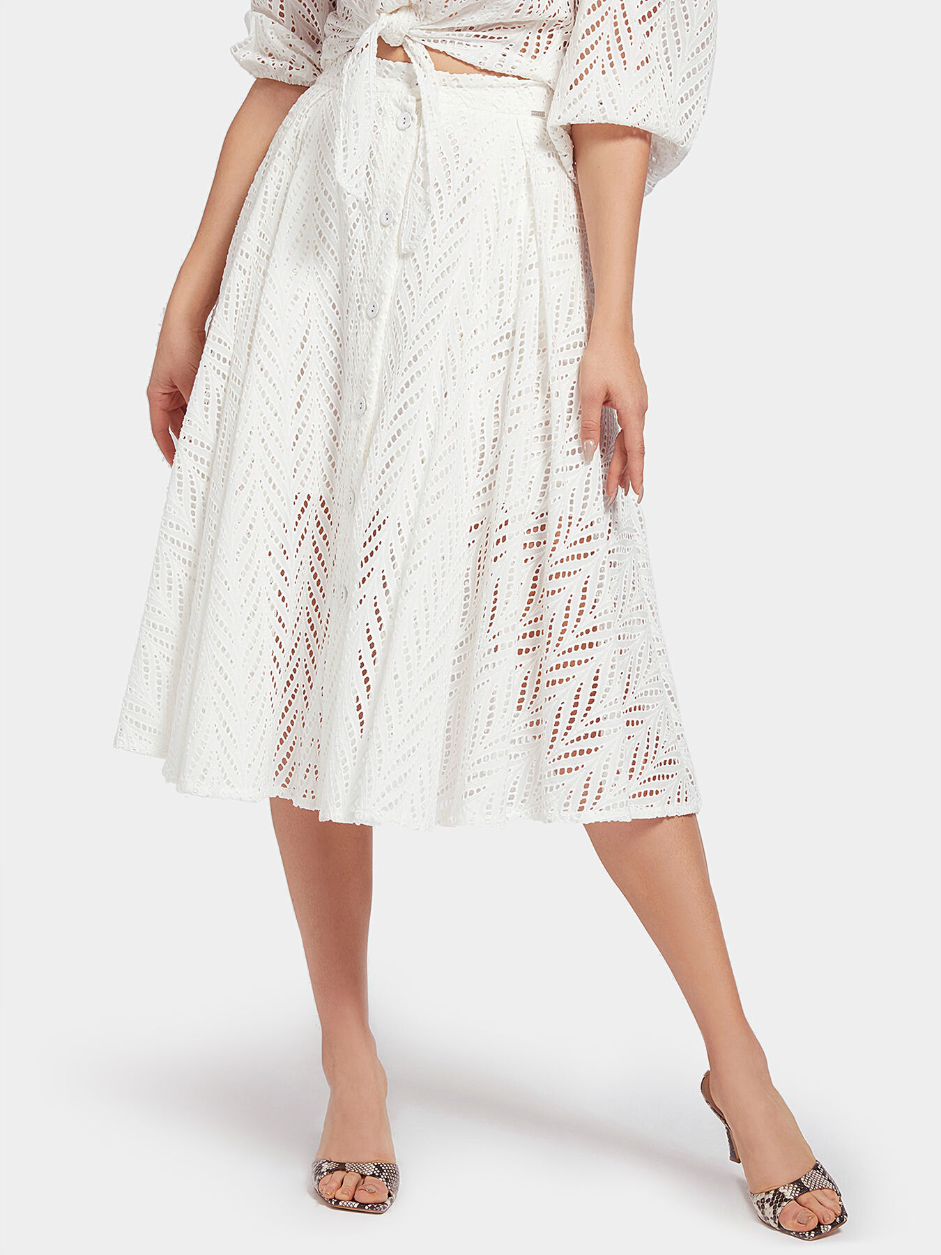 NAJM Skirt with perforations brand GUESS Globalbrandsstore en