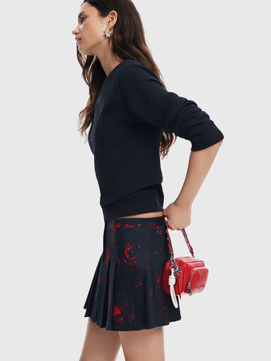 Pleated mini skirt with contrast print - 3