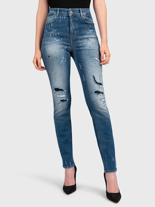 Blue jeans with distressed effect