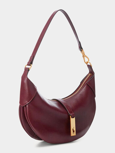 Leather bag in bordeaux color and metal accents - 3