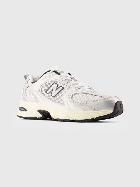 530 white sports shoes with logo accent - 2