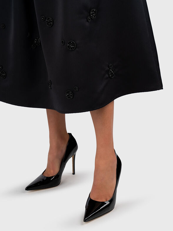 Midi skirt with appliqued rhinestones - 5