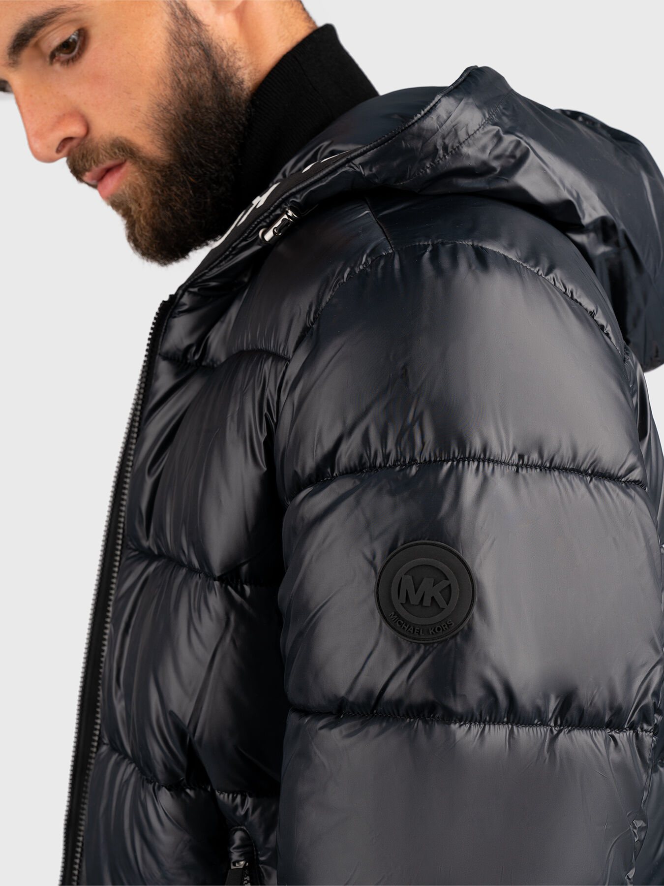 Black puffer jacket with capped effect brand MICHAEL KORS