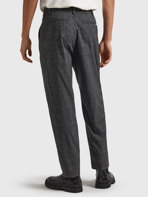 Trousers with checked print - 1