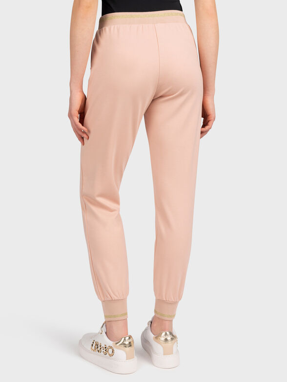 Black sports trousers with shiny logo accent - 2