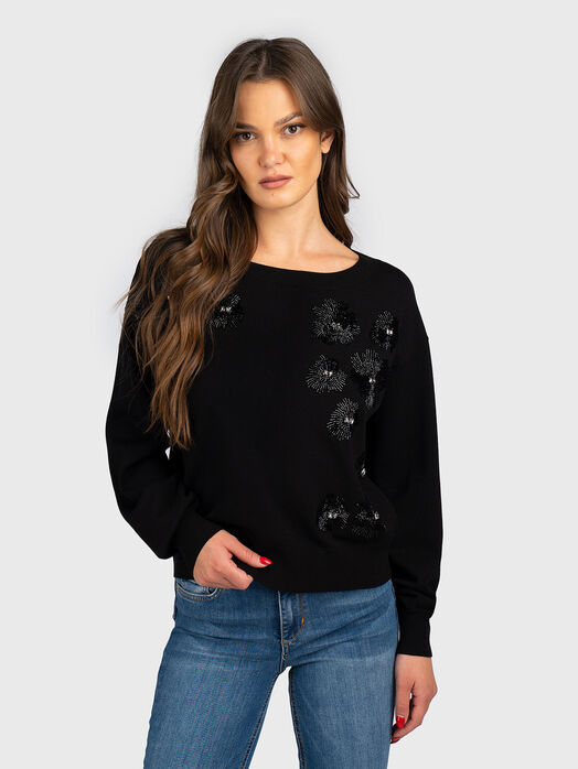 Sweater with rhinestones
