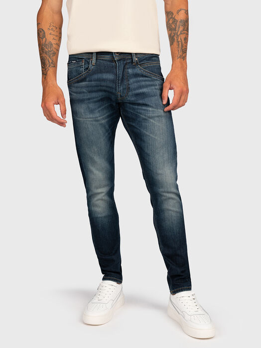 Dark blue jeans with logo patch