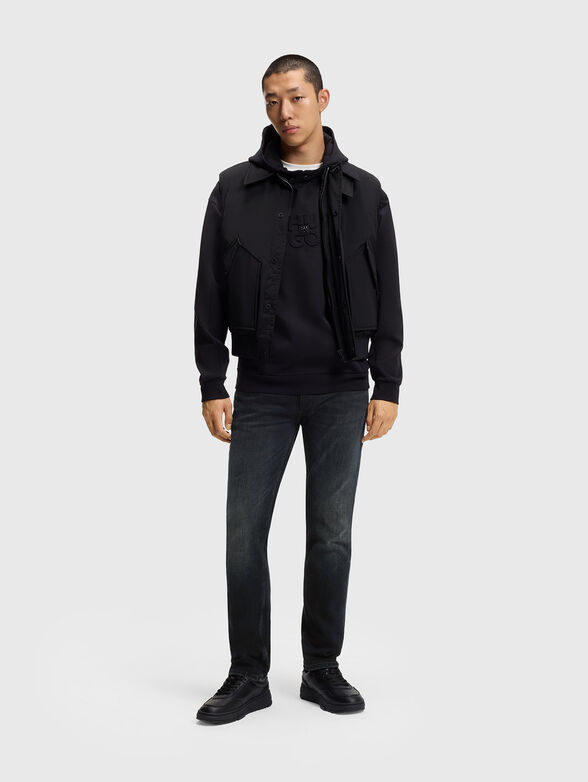 Jeans with worn effect and logo - 4