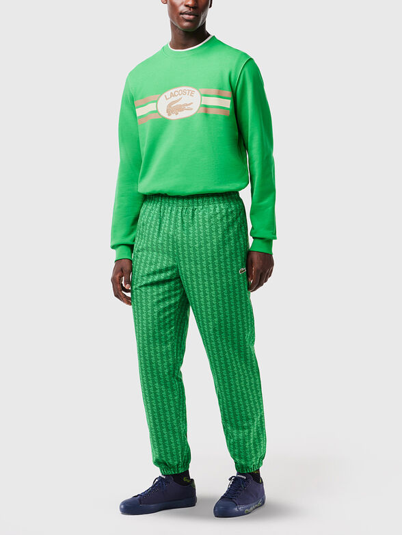 Sports trousers with monogram print - 3