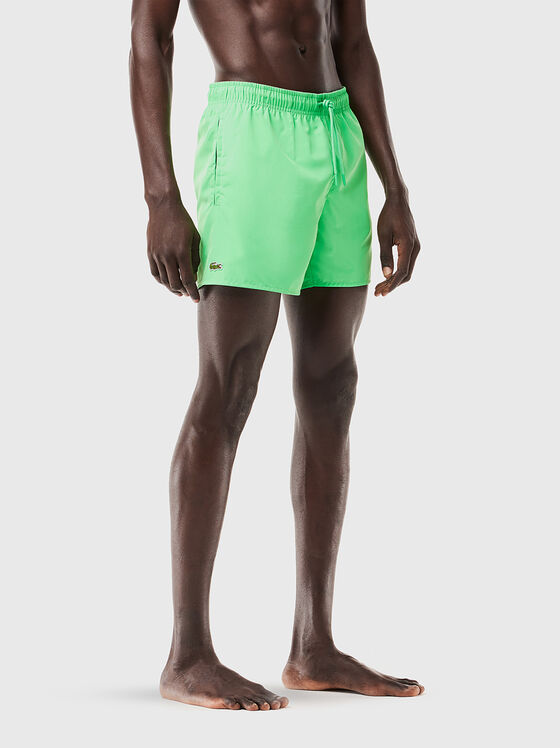 Yellow shorts with logo detail - 1