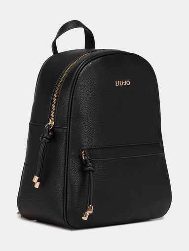 Backpack with metal logo accent - 3