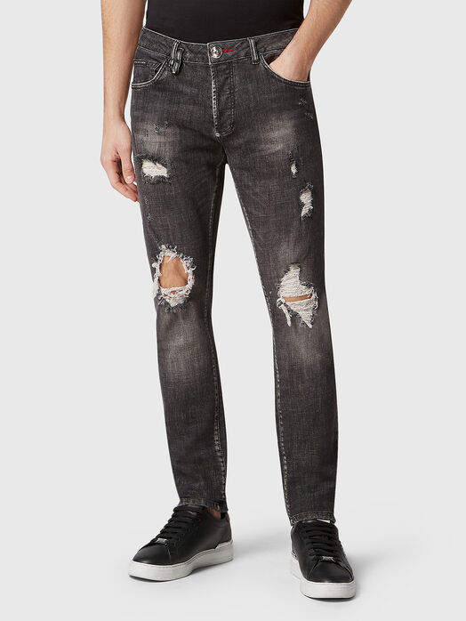 Blue jeans with washed effect and accent rips