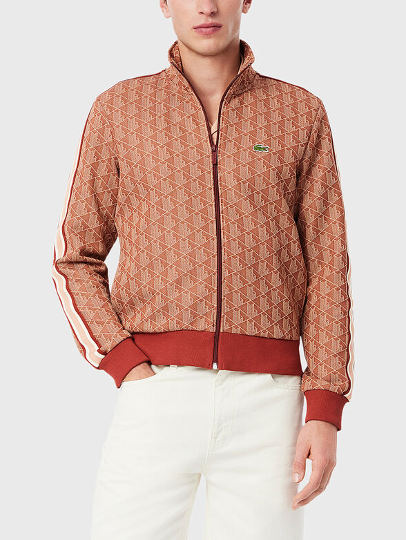 Sweatshirt with monogram print in brown - 1