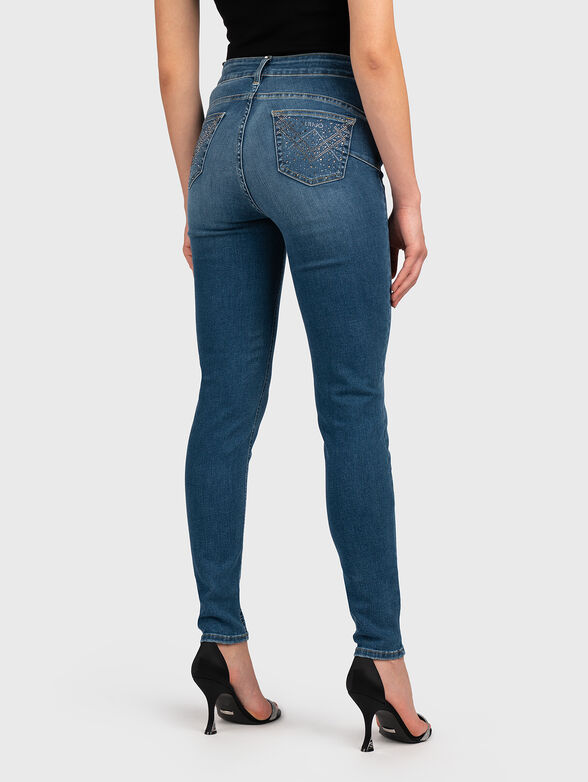 Skinny jeans with appliqued rhinestones - 2