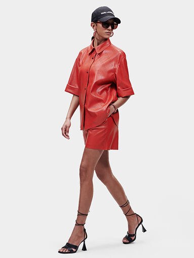 Black faux leather shirt with perforated logos - 4