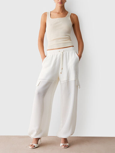 Cargo pants with a mesh texture - 5