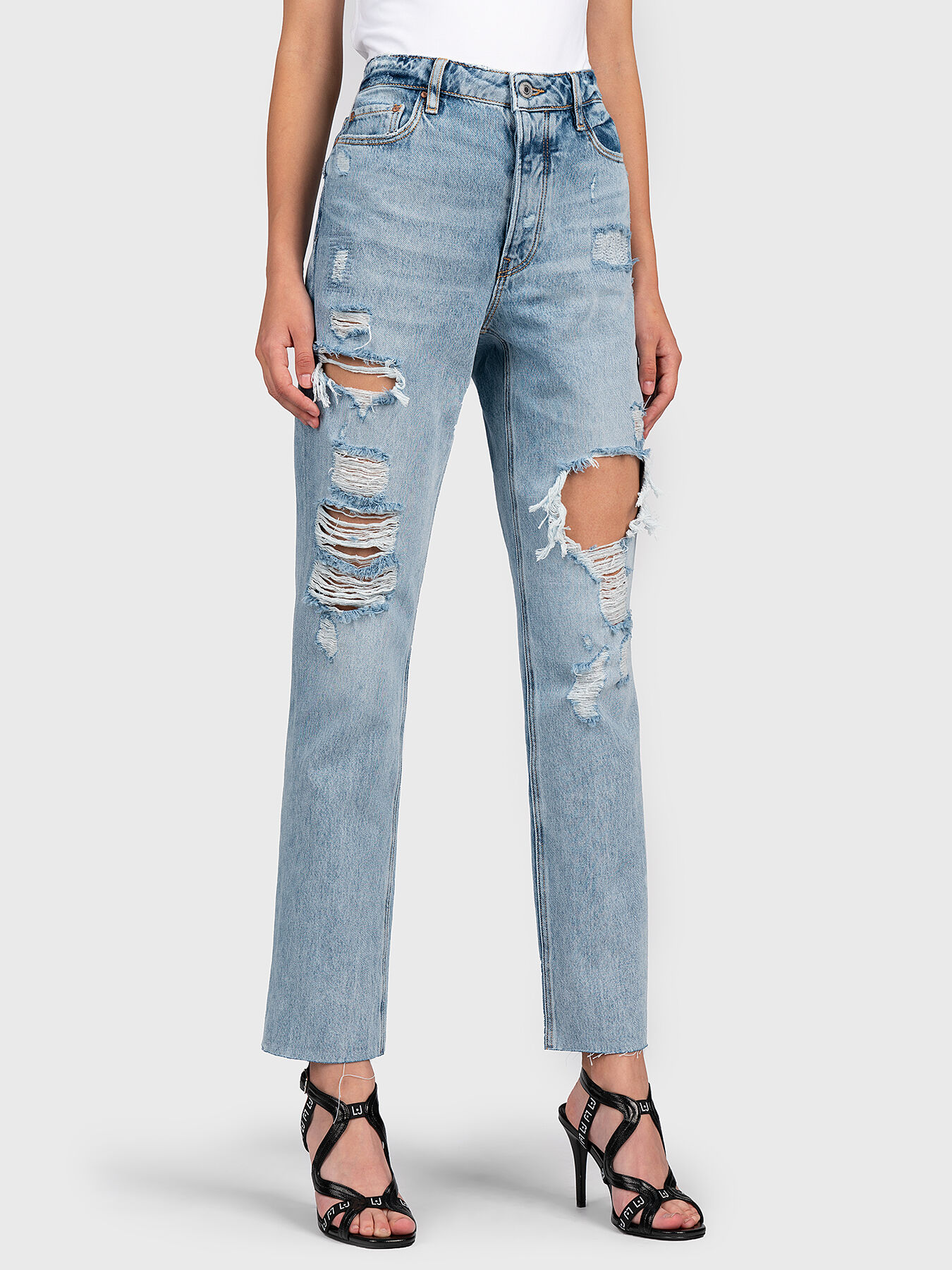 Distressed jeans brand GUESS Globalbrandsstore en