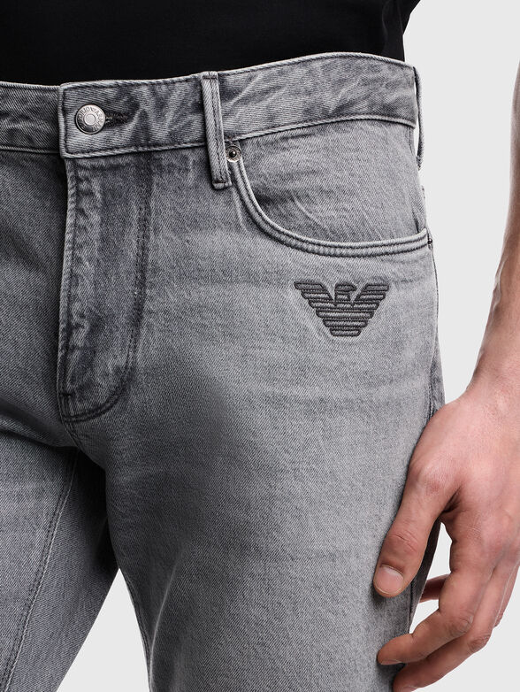 Jeans with a bleached effect and embroidered logo - 3