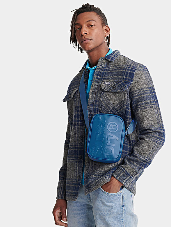 Crossbody bag with embossed logo accent - 2