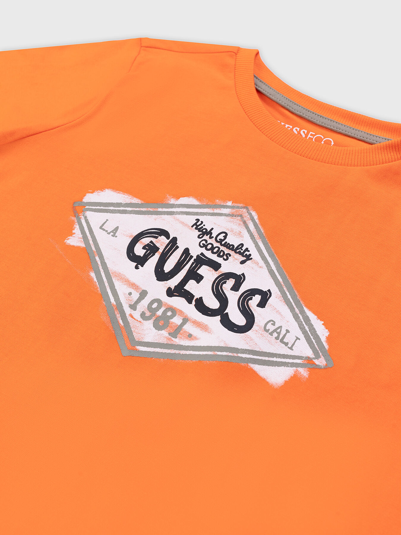 Green and orange guess shirt top