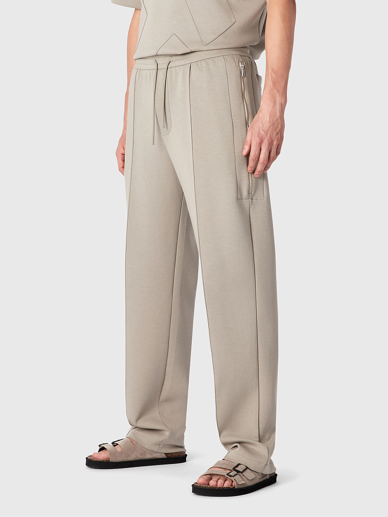 Sports trousers with crease in beige colour brand EMPORIO