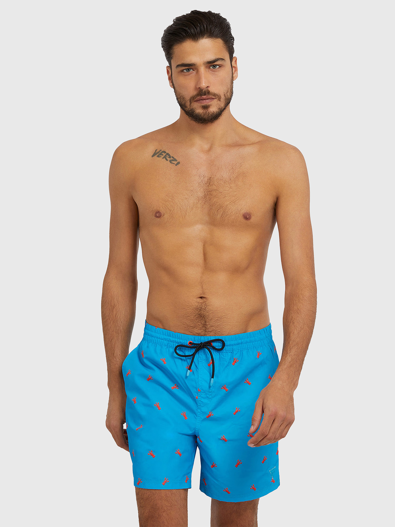 Blue beah shorts with print brand GUESS — Globalbrandsstore.com/en